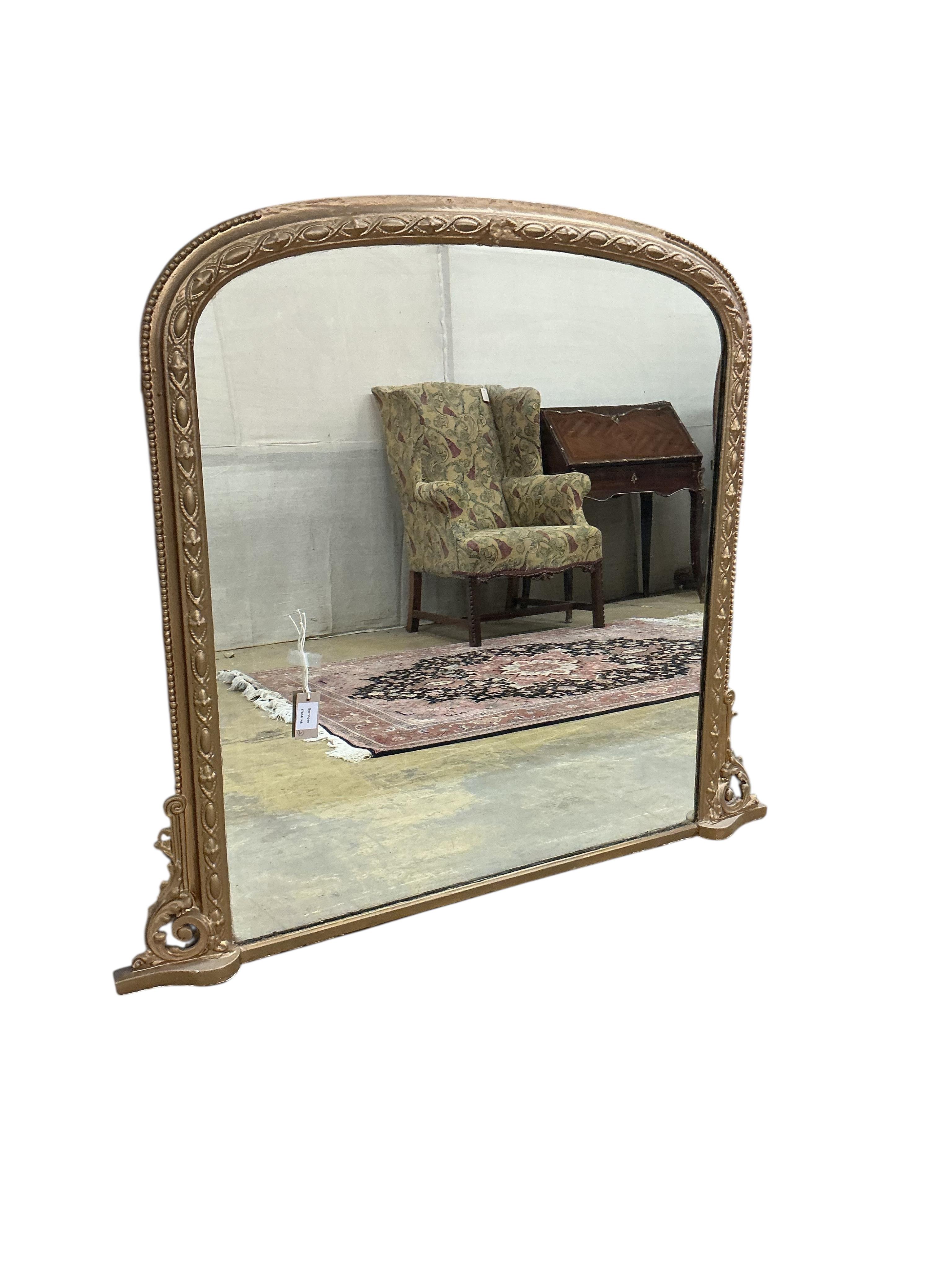 A Victorian giltwood and composition overmantel mirror, later painted, width 120cm, height 107cm